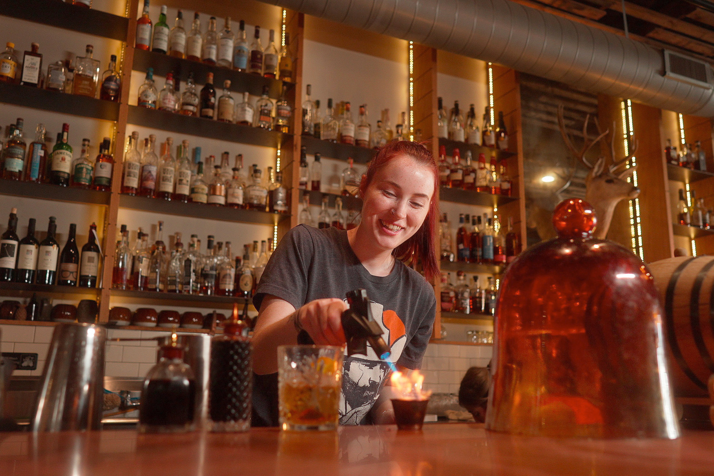 bartender setting drink on fire